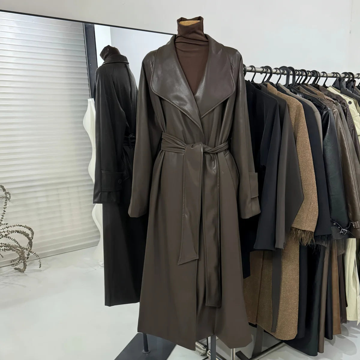 French temperament large lapel collar medium and long leather jacket